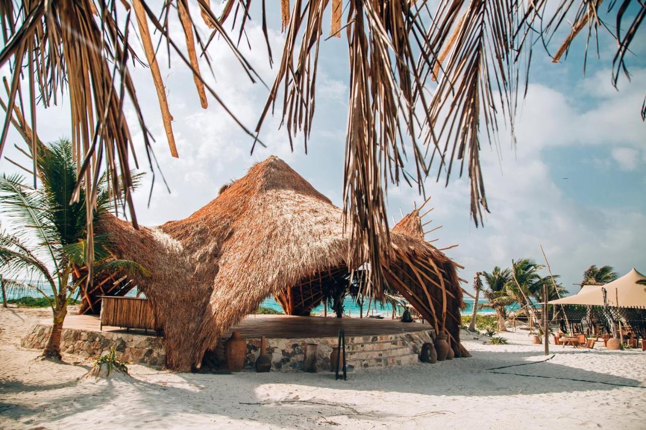 Ikal Tulum Hotel Exterior photo A hut at Akumal