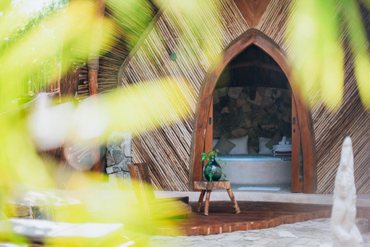 Ikal Tulum Hotel Exterior photo The entrance to the chapel