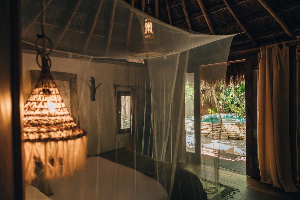 Ikal Tulum Hotel Exterior photo Interior of a bungalow